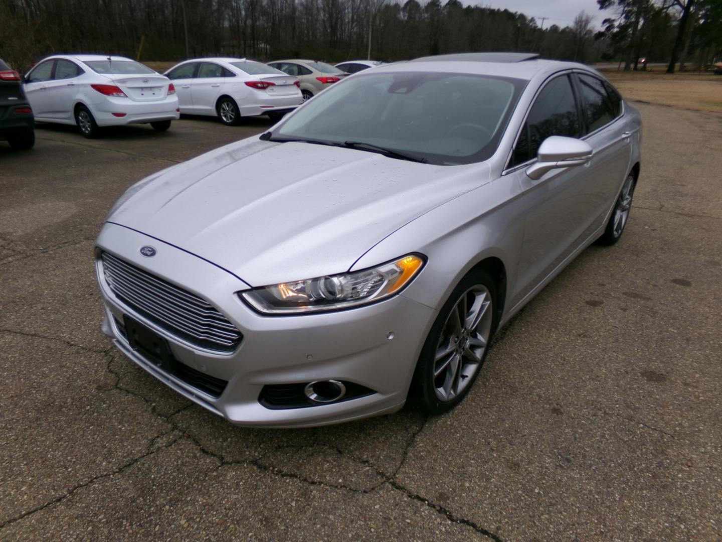 2013 Silver /Black Ford Fusion Titanium (3FA6P0K97DR) with an 2.0L L4 DOHC 16V engine, automatic transmission, located at 401 First NE, Bearden, AR, 71720, (870) 687-3414, 33.726528, -92.611519 - Photo#0